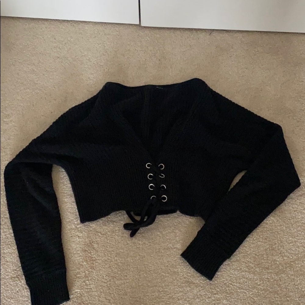 Black tie sweater